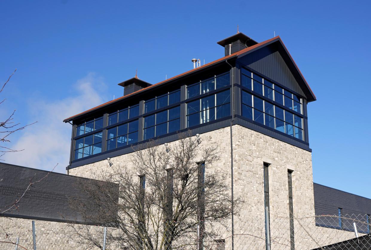 Middle West Spirits added a glass-enclosed top to its new distillery to accommodate a 60-foot-tall copper still.