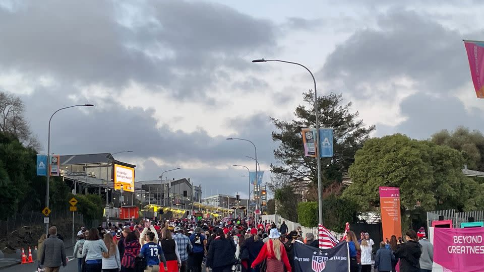 US fans march to Eden Park in Auckland on Tuesday, ahead of the game against Portugal.  - Tara Subramaniam/CNN