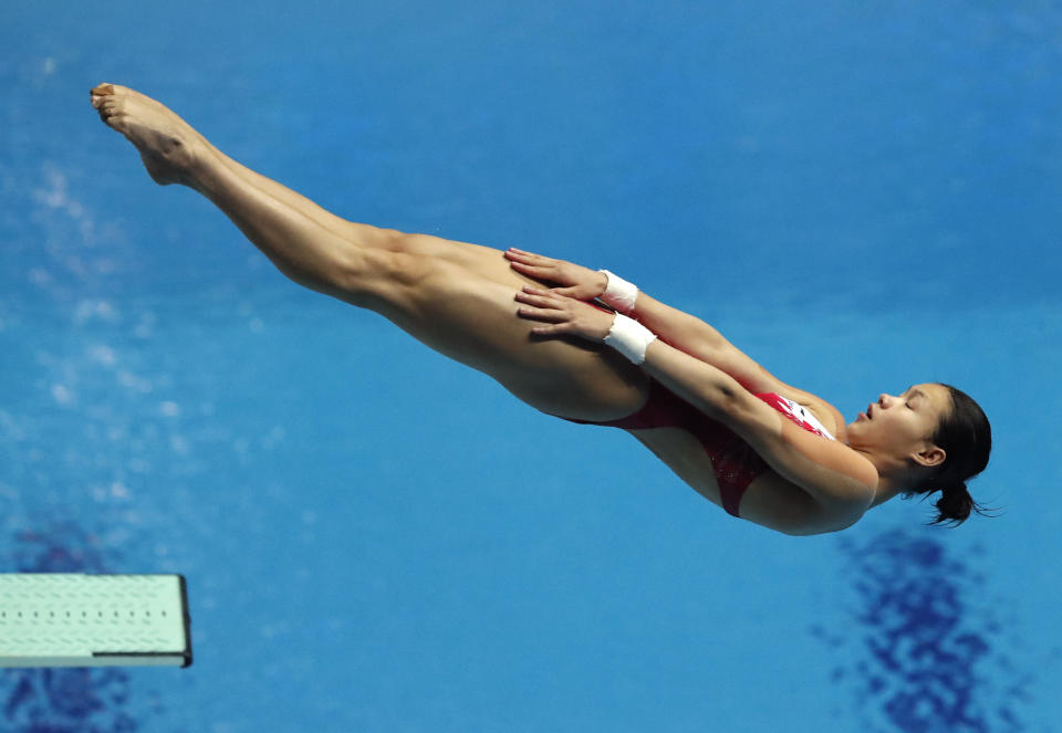 China's Yang Jian performs in the mixed team event diving final at the World Swimming Championships in Gwangju, South Korea, Tuesday, July 16, 2019. (AP Photo/Lee Jin-man )