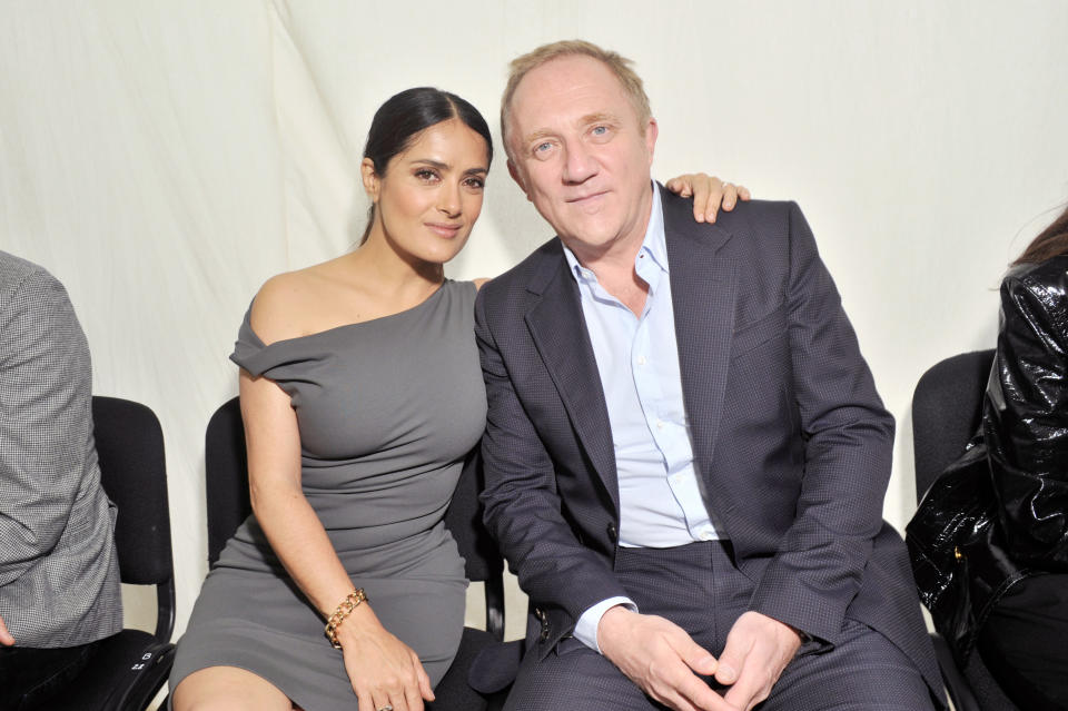 Salma Hayek and Francois-Henri Pinault in the front row (Photo by Swan Gallet/WWD/Penske Media via Getty Images)