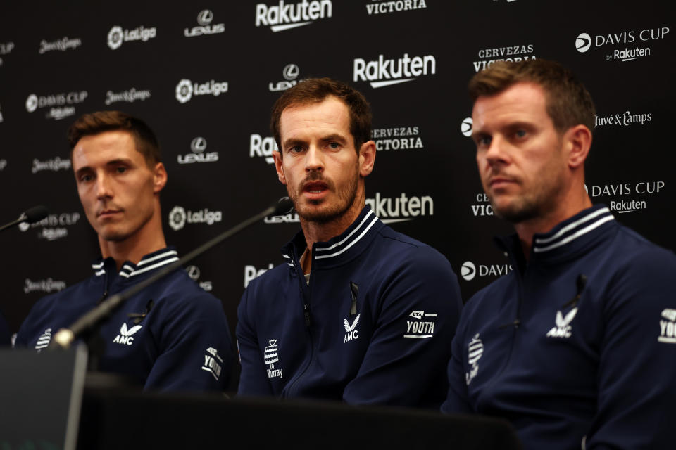 Pictured in the centre, Great Britain's Andy Murray speaks to reporters before his team's Davis Cup Group D match against the USA in Glasgow.