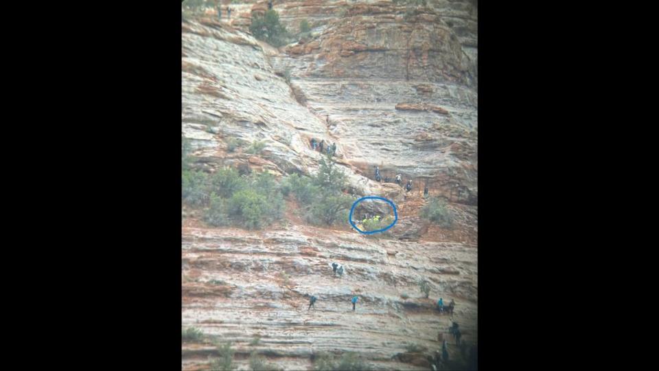 Rescuers used a rope system to lower the woman down the rocks. She was then carried to the Cathedral Rock Trailhead and airlifted to a trauma center.