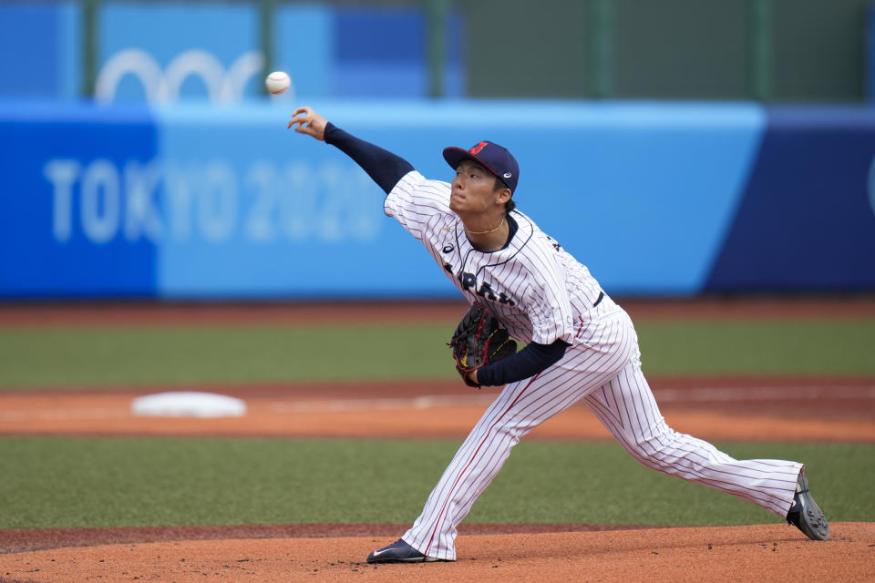 Japan starting pitcher Yoshinobu Yamamoto throws against the Dominican Republic during the first inning of a baseball game at the 2020 Summer Olympics, Wednesday, July 28, 2021, in Fukushima, Japan. (AP Photo/Jae C. Hong)