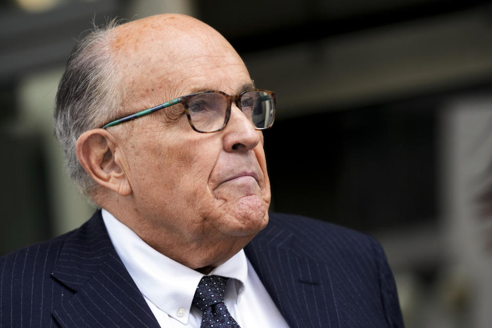 FILE - Rudy Giuliani speaks with reporters as he departs the federal courthouse, May 19, 2023, in Washington. When New York's Adult Survivors Act expired on Friday, Nov. 24, more than 3,700 legal claims had been filed, with many of the last few coming against big-name celebrities, such as Giuliani, and a handful of politicians. (AP Photo/Patrick Semansky, File)