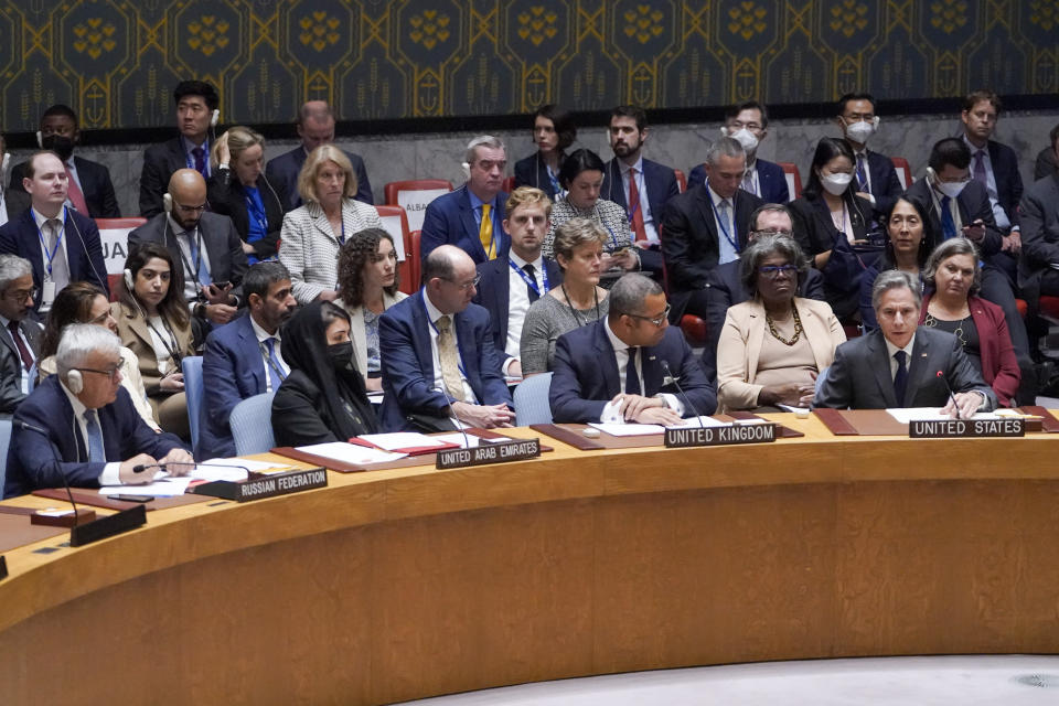 Russian Deputy Foreign Minister Sergey Vershinin, left, listens as United States Secretary of State Antony Blinken, right, speaks during a high level Security Council meeting on the situation in Ukraine, Thursday, Sept. 22, 2022 at United Nations headquarters. (AP Photo/Mary Altaffer)