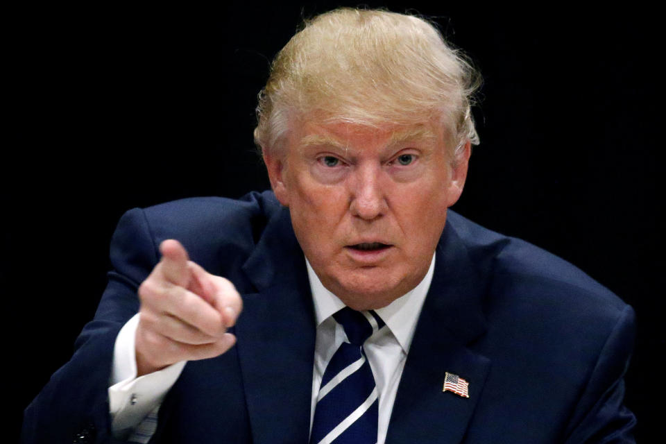 FILE PHOTO: Republican Donald Trump appears at a campaign roundtable event in Manchester, New Hampshire, U.S., October 28, 2016. REUTERS/Carlo Allegri/File Photo