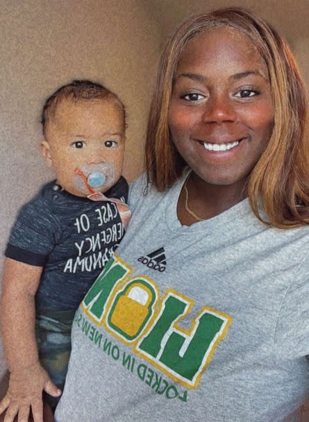 PHOTO: Ashley Webster, an assistant basketball coach at Saint Leo University, holds her son, Aiden. (Courtesy Ashley Webster)