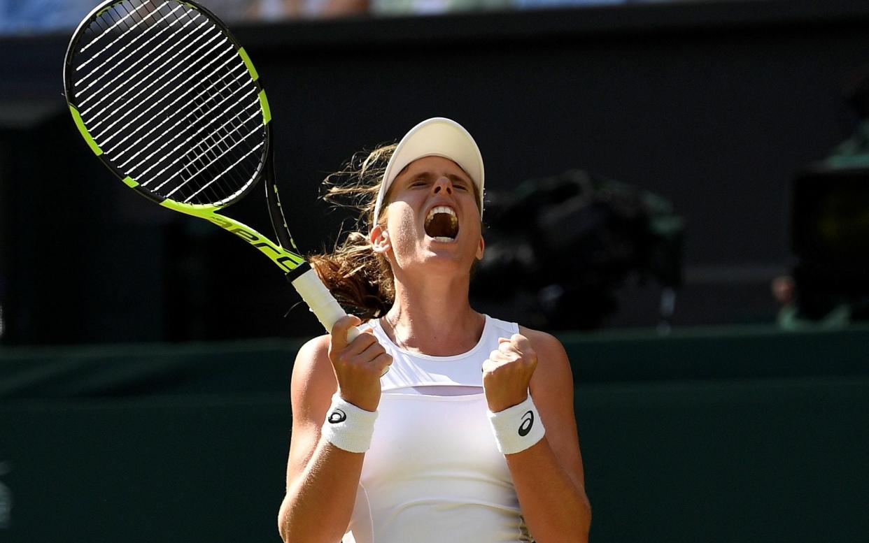 Johanna Konta screams in delight and relief at the moment of victory - REUTERS