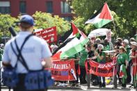 Palestinian activists protest in front of the Zurich venue for the FIFA congress