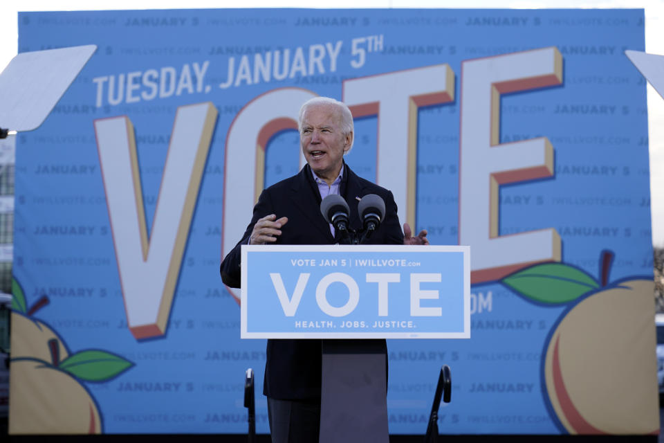 President-elect Joe Biden speaks in Atlanta, Monday, Jan. 4, 2021, as he campaigns for Senate candidates Raphael Warnock and Jon Ossoff. (AP Photo/Carolyn Kaster)