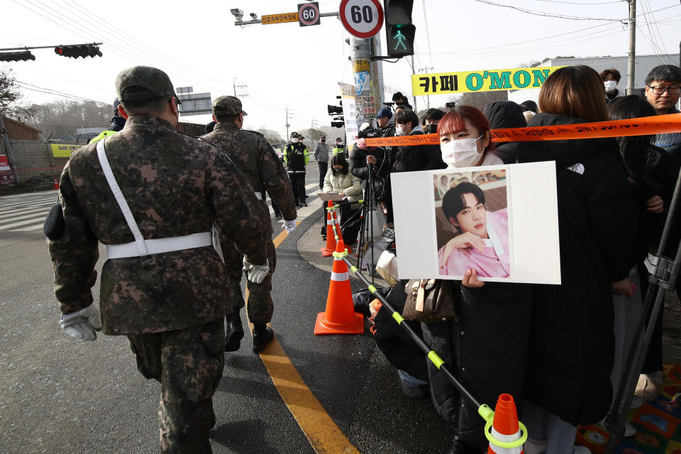 Fans wait to see BTS's Jin join the military in front of the 5th Infantry Division recruit training center, December 13, 2022 in Yeoncheon-gun, South Korea. / Credit: Chung Sung-Jun/Getty