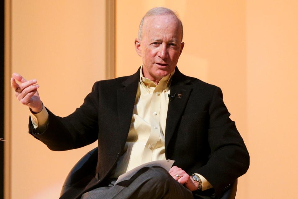 Purdue University President Mitch Daniels speaks with Kenneth Feinberg during a Presidential Lecture Series, Tuesday, Feb. 1, 2022 in West Lafayette. Feinberg, a Washington, D.C.-based attorney, has overseen victim assistance efforts after the 9/11 terror attacks, the Boston marathon bombing and other tragedies.