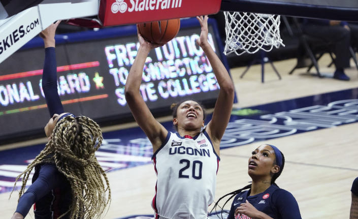 Connecticut forward Olivia Nelson-Ododa (20) shoots against St. John's during the first half of an NCAA college basketball game Wednesday, Feb. 3, 2021, in Storrs, Conn. (David Butler II/Pool Photo via AP)