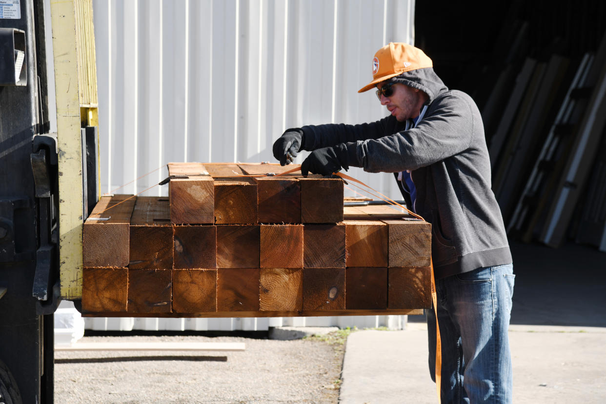 Image: Lumber is transported in Colorado (Hyoung Chang / Denver Post via Getty Images file)