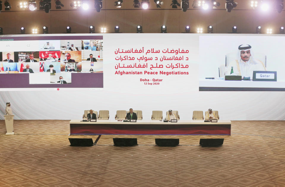 Qatar's Minister of Foreign Affairs Sheikh Mohamad Bin Abdel Rahman Al-Thani, from left, talks to the audience as U.S. Special Representative for Afghanistan Reconciliation Zalmay Khalilzad, U.S. Secretary of State Mike Pompeo, Qatar's Minister of Foreign Affairs Sheikh Mohamad Bin Abdel Rahman Al-Thani and Mutlaq bin Majid al-Qahtani, the special envoy of the Qatari Foreign Minister for Terrorism and Mediation in the Settlement of Disputes, attend the opening session of the peace talks between the Afghan government and the Taliban in Doha, Qatar, Saturday, Sept. 12, 2020. (AP Photo/Hussein Sayed)