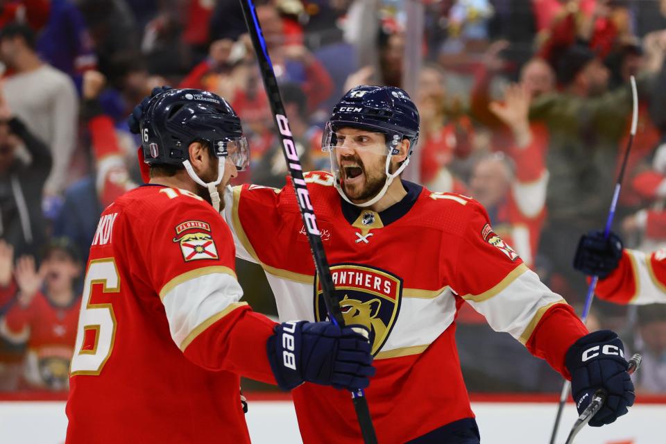 May 28, 2024; Sunrise, Florida, USA; Florida Panthers center Sam Reinhart (13) celebrates with center Aleksander Barkov (16) after scoring the game-winning goal during overtime against the New York Rangers in game four of the Eastern Conference Final of the 2024 Stanley Cup Playoffs at Amerant Bank Arena. Mandatory Credit: Sam Navarro-USA TODAY Sports