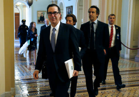 U.S. Secretary of the Treasury Steven Mnuchin arrives for a meeting on tax reform with Senate Majority Leader Mitch McConnell (R-KY) (not pictured) and Speaker of the House Paul Ryan (R-WI) (not pictured) on Capitol Hill in Washington, U.S., April 25, 2017. REUTERS/Joshua Roberts