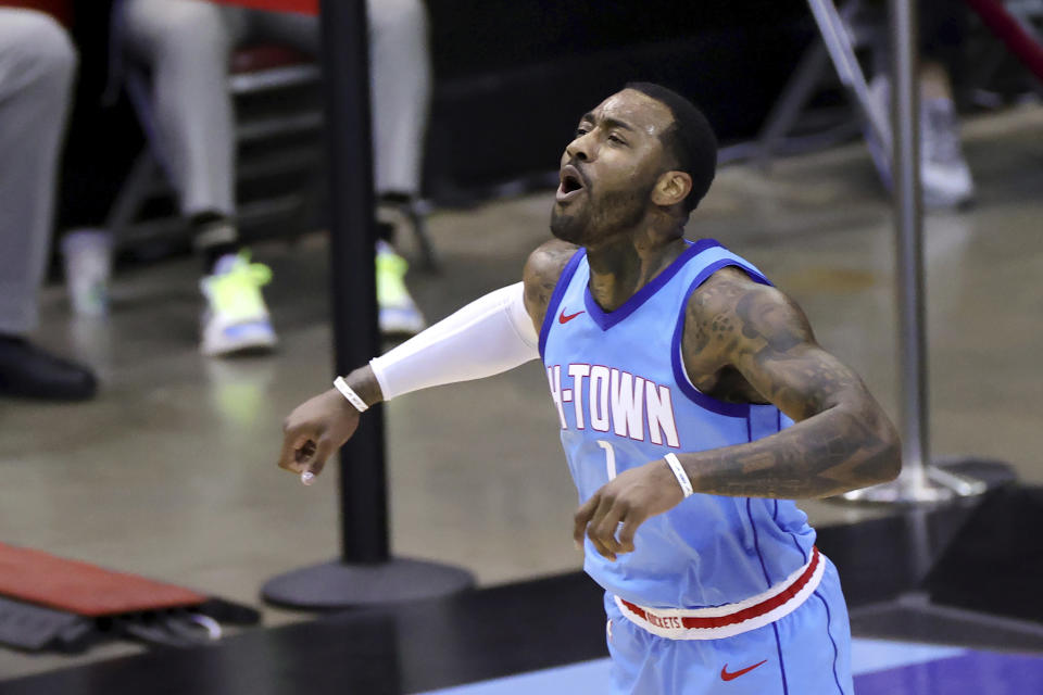 Houston Rockets' John Wall reacts during the second quarter against the Washington Wizards in an NBA basketball game Tuesday, Jan. 26, 2021, in Houston. (Carmen Mandato/Pool Photo via AP)