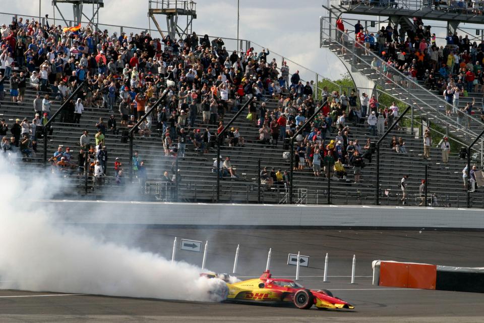 Chip Ganassi Racing driver Alex Palou (10) does a burnout near the first turn Saturday, May 11, 2024, after winning the Sonsio Grand Prix at Indianapolis Motor Speedway.