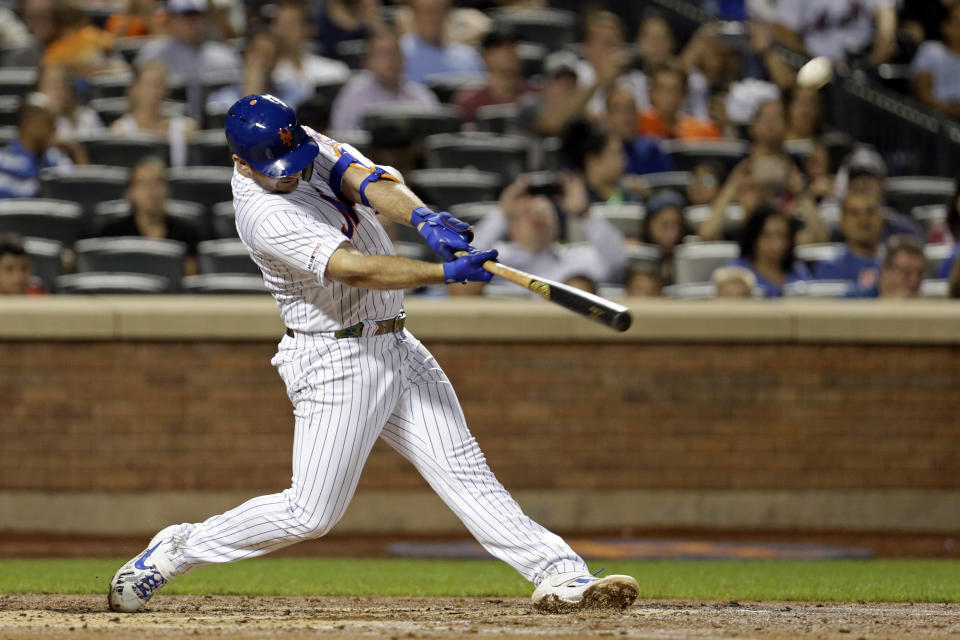 FILE - In this Sept. 28, 2019, file photo, New York Mets' Pete Alonso hits his 53rd home run of the season during the third inning of a baseball game against the Atlanta Braves, in New York. Alonso at the plate. Jacob deGrom on the mound. And a healthy Yoenis Céspedes pegged conveniently for designated hitter. There’s no question the New York Mets have reasons to believe this pandemic-shortened season is perfect for them -- even without injured starter Noah Syndergaard. All they need to do is pick right up where they left off last year.(AP Photo/Adam Hunger, File)