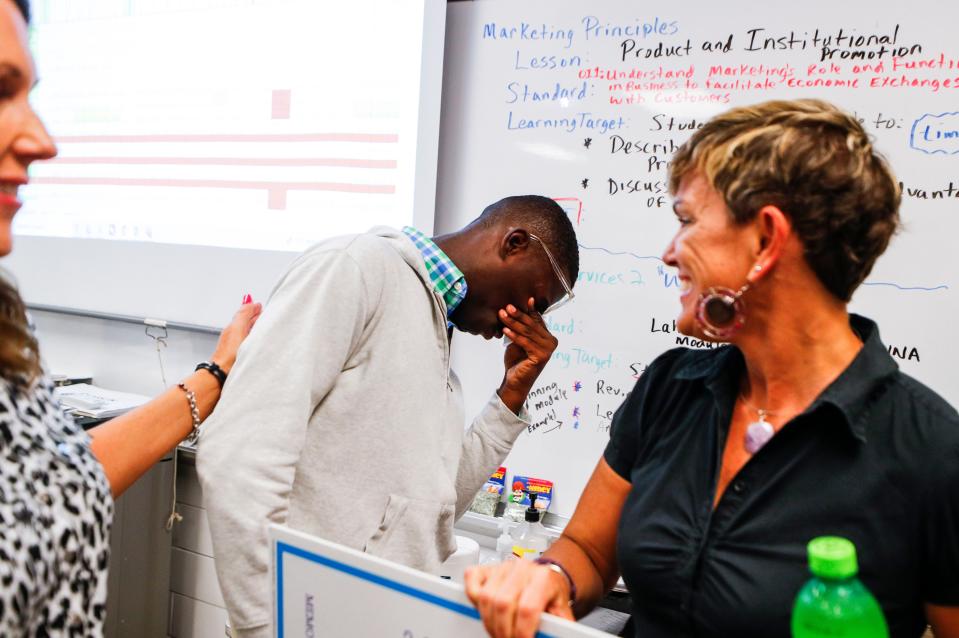 Southern High Student Jonah Belance is overcome with emotion after he received a $10,500 scholarship check to UofL from JCPS Friday morning. He said the school's teachers, his friends and his mother, who works an overnight shift, helped him with his success. May 19, 2023.