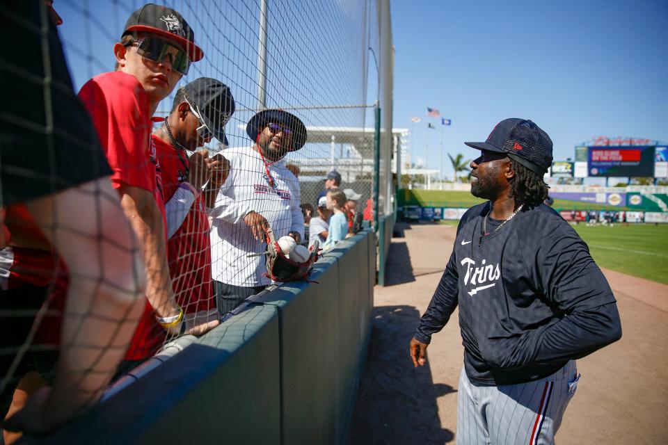 Third Base Coach/Outfield Coach Tommy Watkins talks with members of the South Fort Myers baseball team during the first full-squad spring training workout for the Minnesota Twins at Hammond Stadium in Fort Myers on Monday, Feb. 20, 2023. 