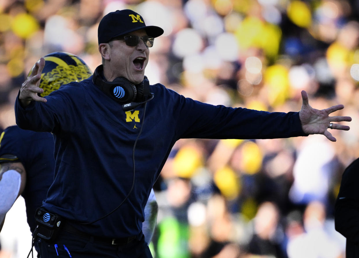 Jim Harbaugh and Michigan have been on a roller coaster this year that included multiple three-game suspensions.  (Keith Birmingham/Getty Images)