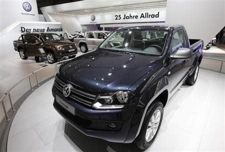 The new 'Amarok' vehicle is displayed at the Volkswagen exhibition area during a preview day at the IAA commercial vehicles trade fair in Hanover September 21, 2010. REUTERS/Christian Charisius