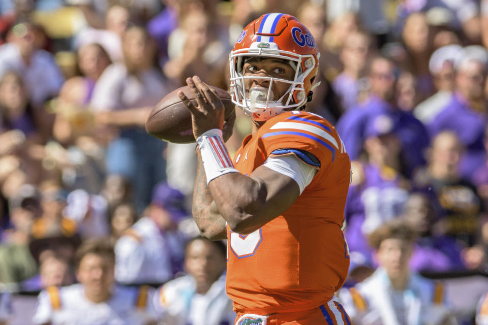 Florida quarterback Anthony Richardson (15) throws in the second half of an NCAA college football game against LSU in Baton Rouge, La., Saturday, Oct. 16, 2021. (AP Photo/Matthew Hinton)