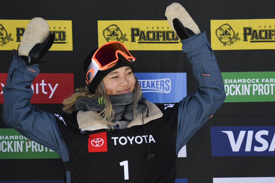 Gold medalist Chloe Kim, of the United States, celebrates after winning the women's snowboard halfpipe final at the freestyle ski and snowboard world championships, Friday, Feb. 8, 2019, in Park City, Utah. (AP Photo/Alex Goodlett)