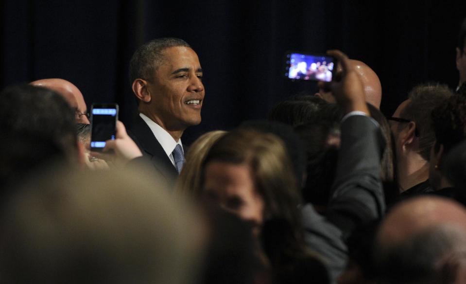 President Barack Obama greets the crowd after speaking at a Democratic National Committee reception in San Jose, Calif., Thursday, May 8, 2014. Obama is spending three days in California raising money for the Democratic party. (AP Photo/Susan Walsh)