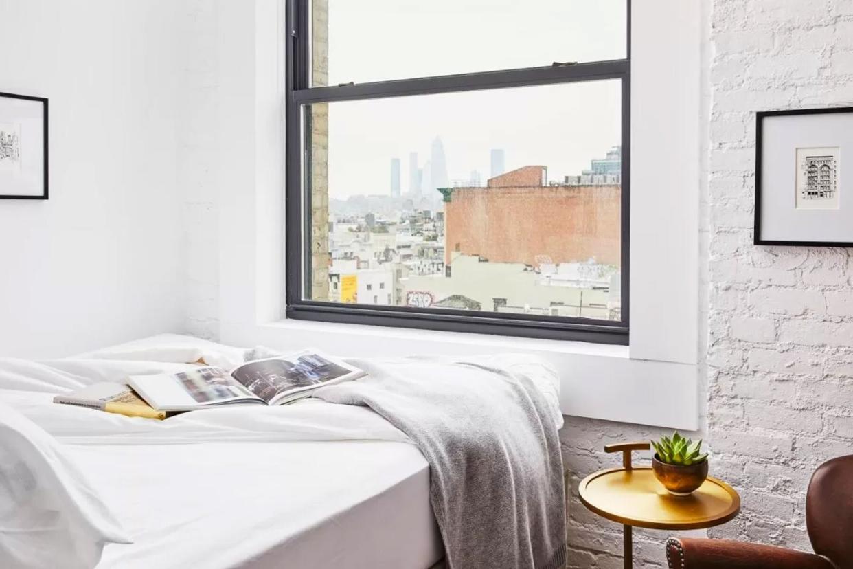 Hotel bed and window