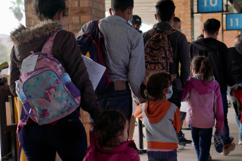 FILE PHOTO: Asylum seekers at the bus station in Brownsville, Texas