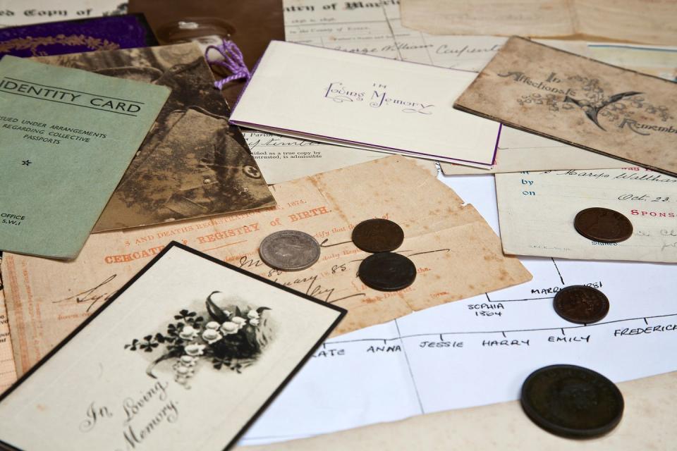 a group of cards and coins