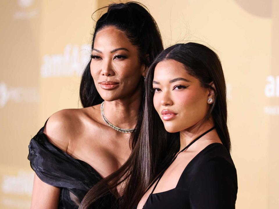 <p>Image Press Agency/NurPhoto/Shutterstock </p> Kimora Lee Simmons and daughter Ming Lee Simmons arrive at the 2022 amfAR Gala