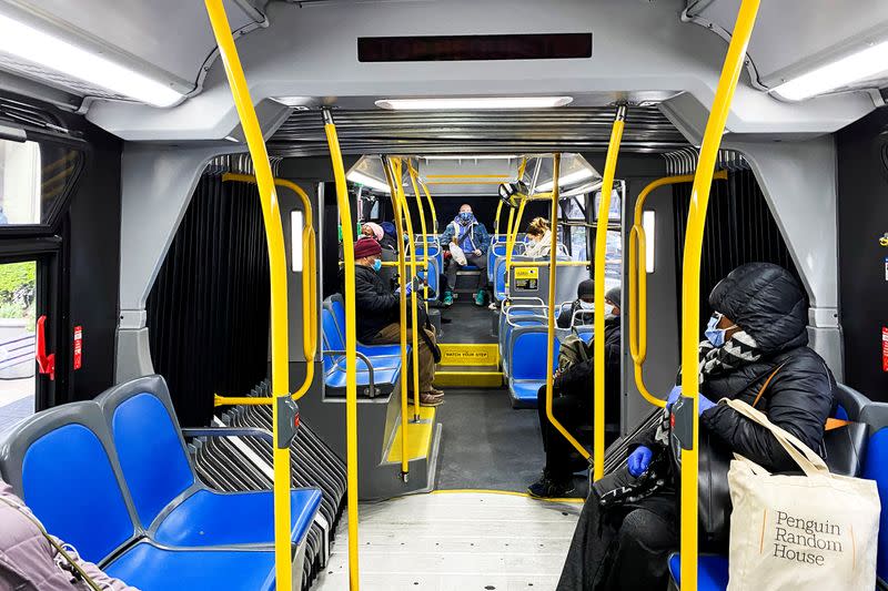 People try to keep social distance as they use the New York City The Metropolitan Transportation Authority (MTA) bus system during the outbreak of the coronavirus disease (COVID-19) in New York City, New York