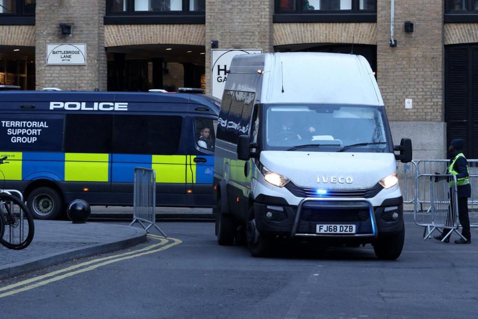 A van arrives to Southwark Crown Court in London earlier (AFP via Getty Images)