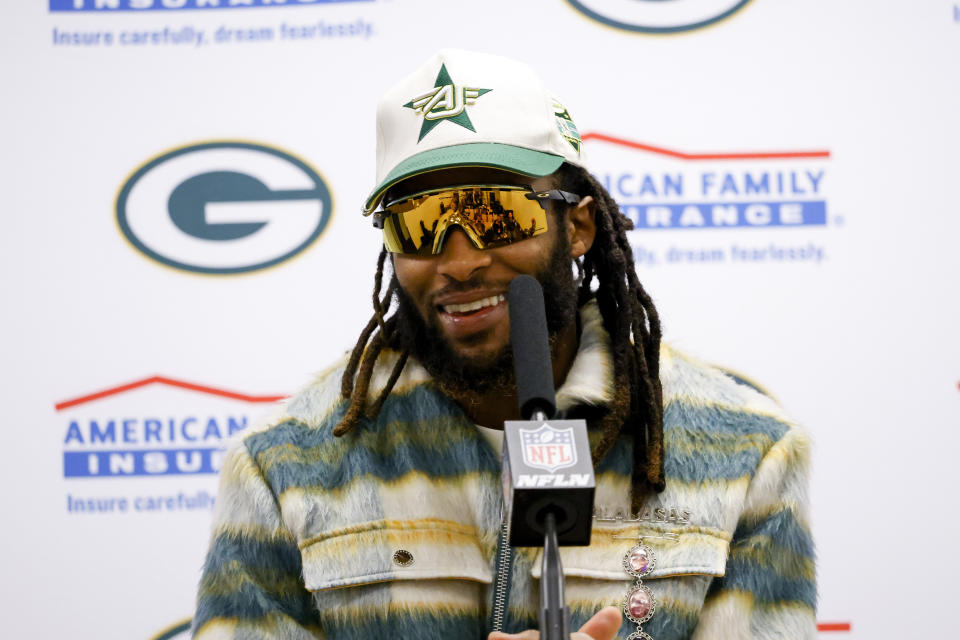 Green Bay Packers running back Aaron Jones speaks to reporters following an NFL football game against the Dallas Cowboys, Sunday, Jan. 14, 2024, in Arlington, Texas. The Packers won 48-32. (AP Photo/Michael Ainsworth)