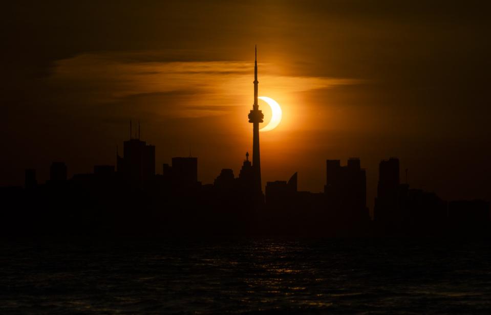 Image of eclipse behind Canada's CN Tower is AIgenerated