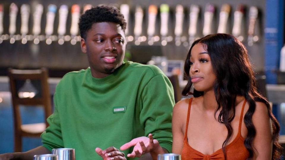 “The Ultimatum: Marry or Move On” cast Treyvon Brunson and Jeriah Nelson at Catawba Brewing Co. in episode 207 of The Ultimatum: Marry or Move On. Cr. Courtesy of Netflix © 2023