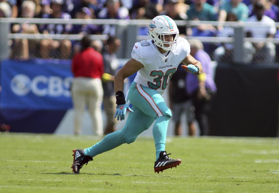 Dolphins fullback Alec Ingold, in action against the Ravens on Sunday: ‘At some point, you’re just a kid out there playing ball.'