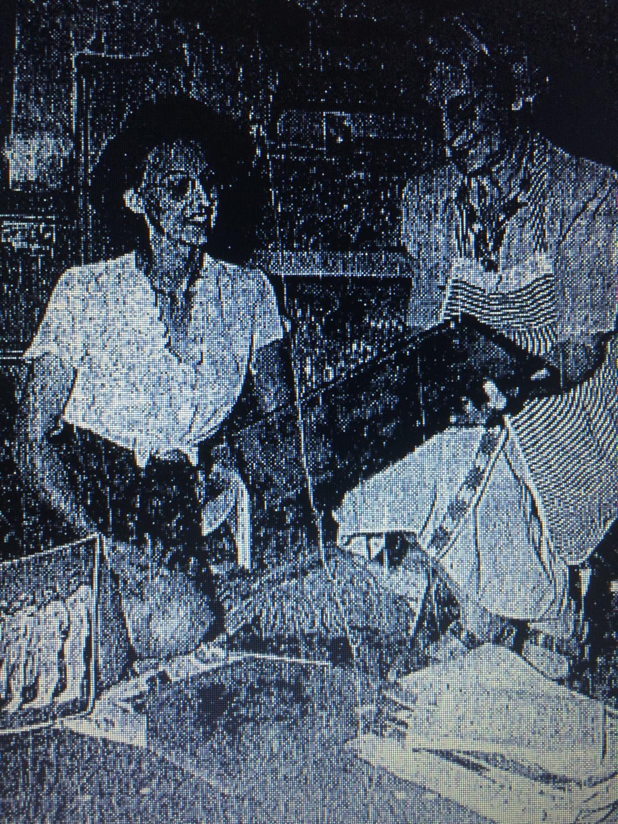 While packing to move to Florida in the summer of 1947, former circus trapeze artist Edythe Siegrist shows Richville neighbor Kathleen Mattern a prized keepsake.