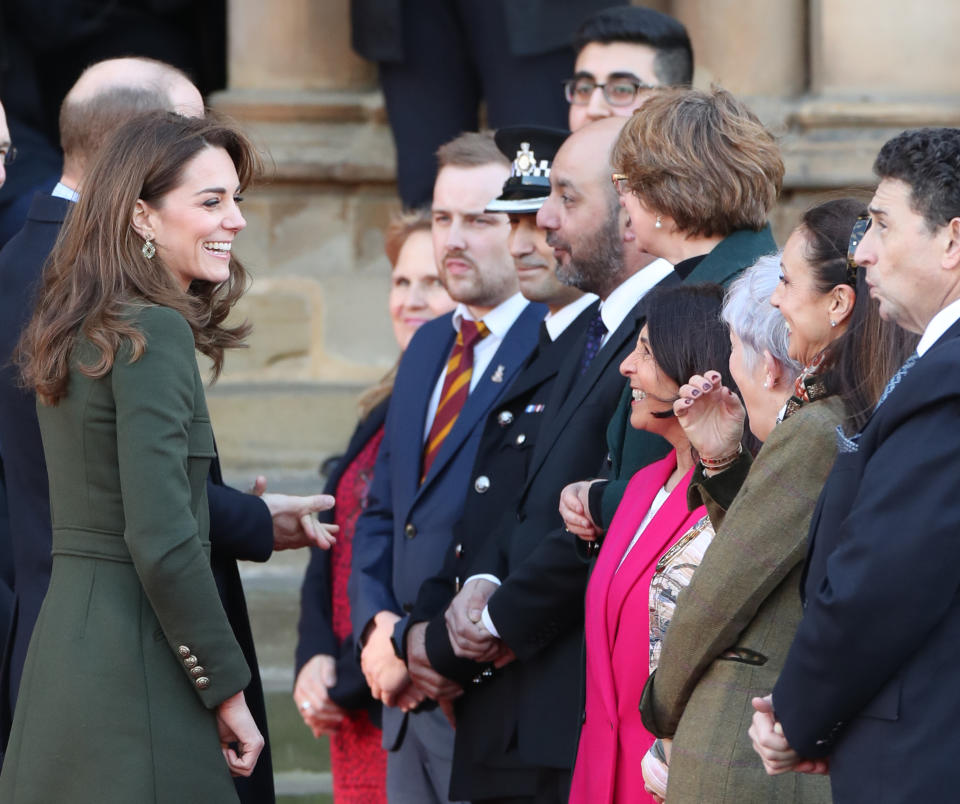 The Duke (hidden) and Duchess of Cambridge arrive for a visit to City Hall in Bradford to join a group of young people from across the community to hear about life in the city. [Photo: PA]