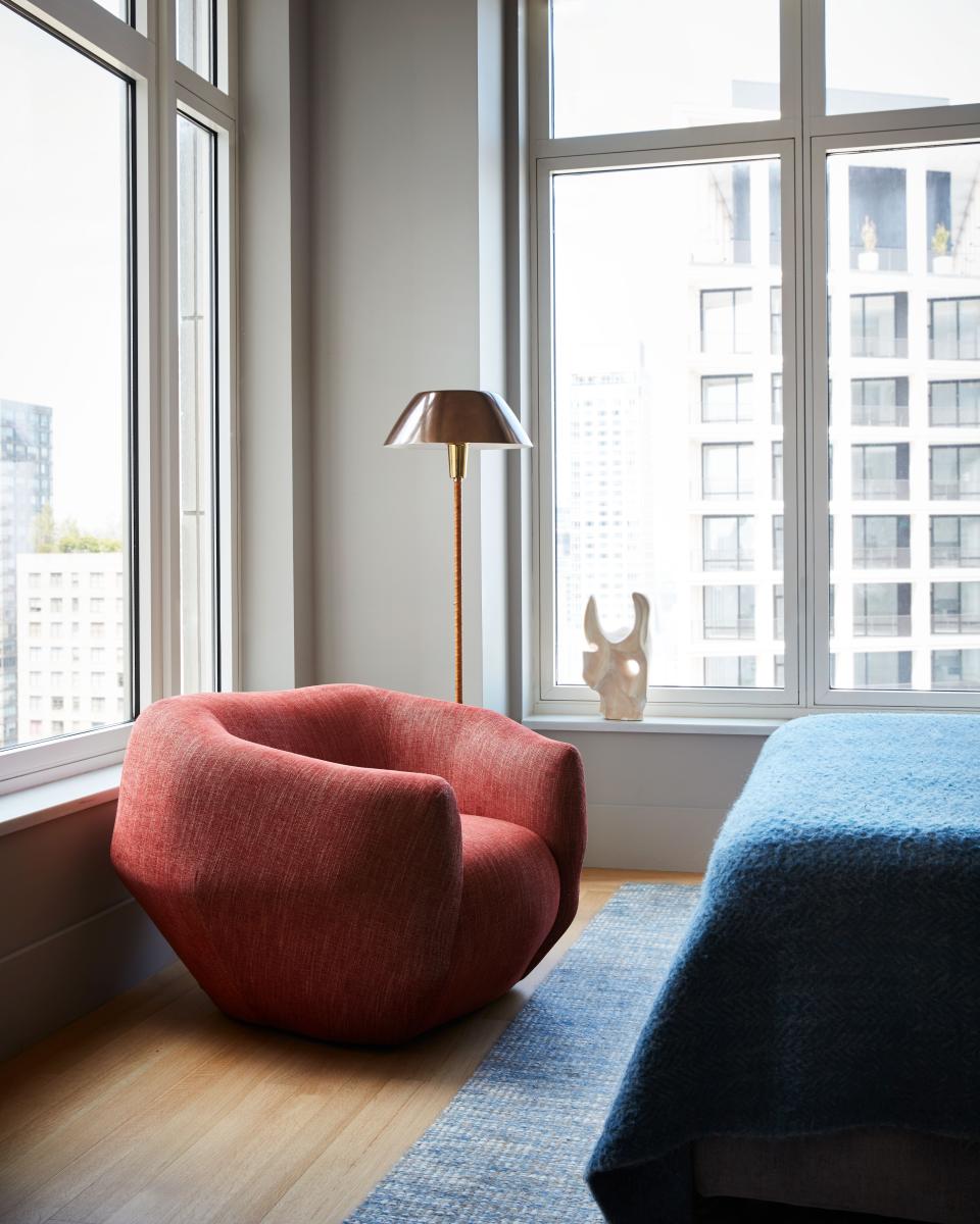 Zaoui’s son’s room features an “Asymétrie” armchair by Yovanovitch, upholstered in a paprika-hued rayon-and-linen blend. The piece is available at The Invisible Collection. A vintage lamp by Finnish designer Lisa Johansson-Pape stands behind it.