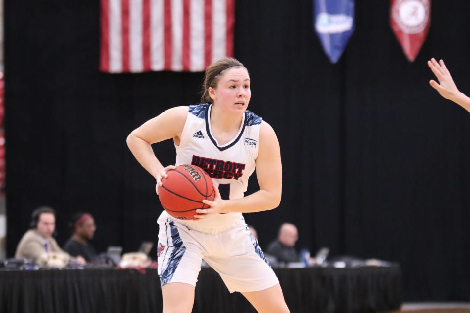 University of Detroit Mercy guard Abbie McDowell (Tecumseh) looks to pass the ball during a game for the Titans.