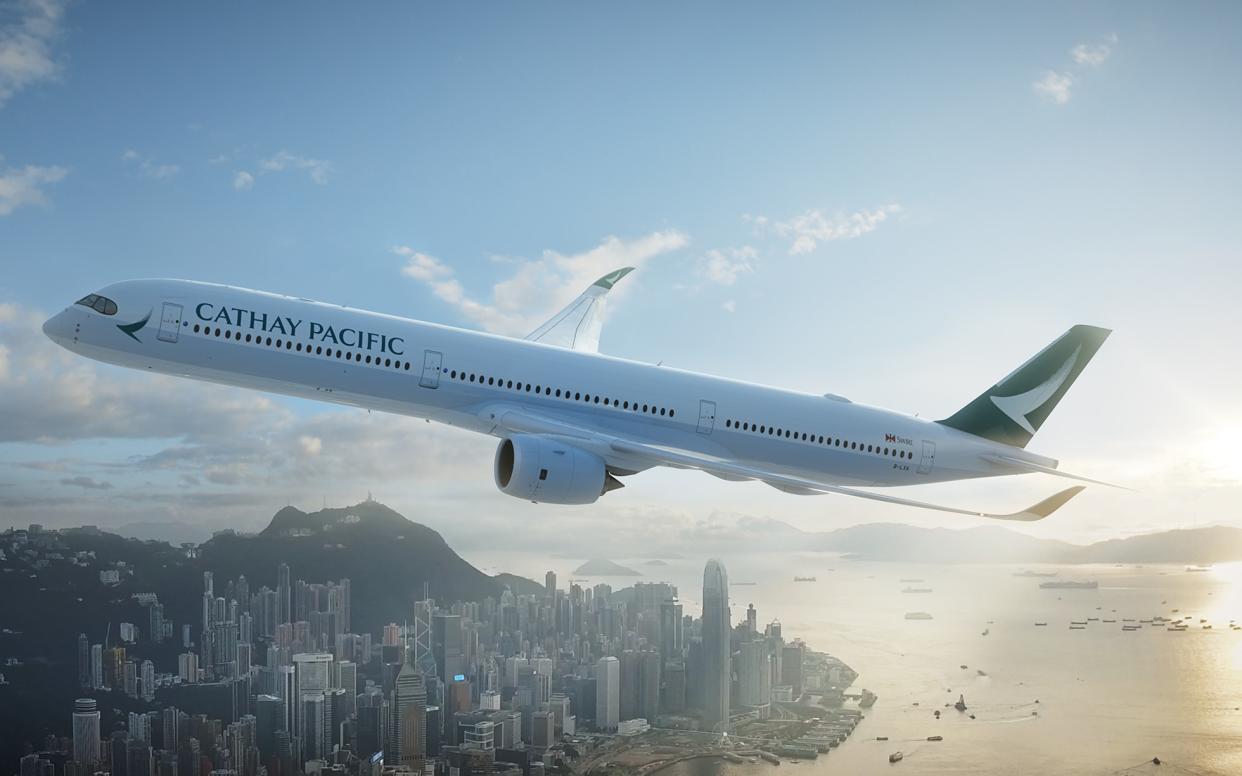 Cathay Pacific plane over Hong Kong