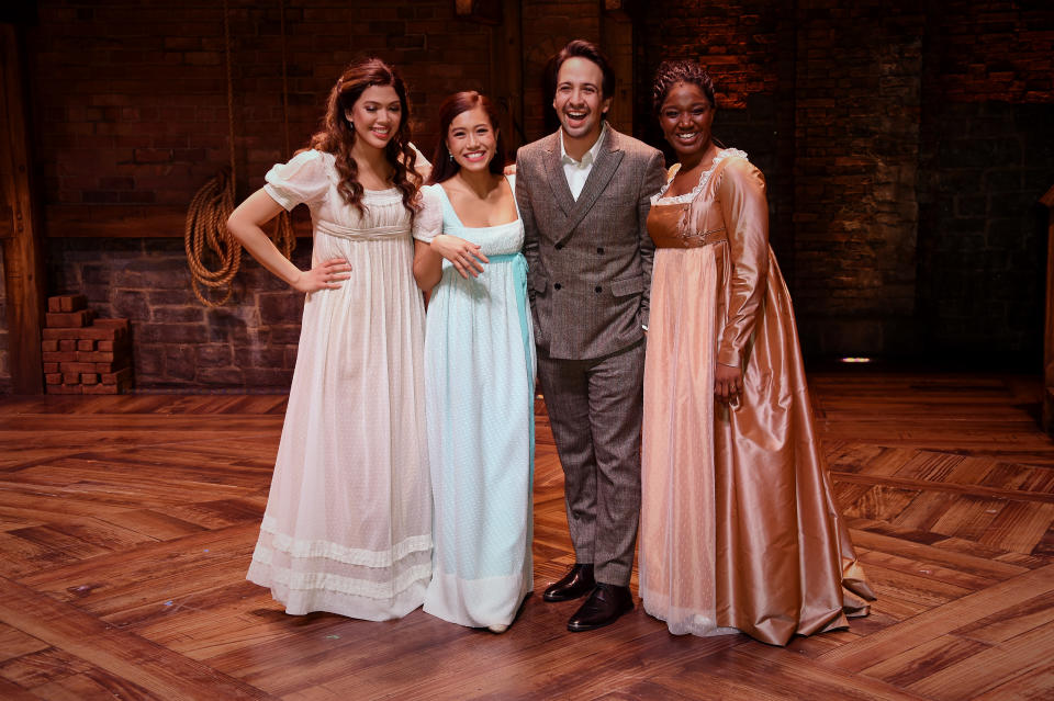 LONDON, ENGLAND - DECEMBER 21:  Christine Allado, Rachelle AnnGo, Lin-Manuel Miranda and Rachel John during the curtain call of the press night performance of 