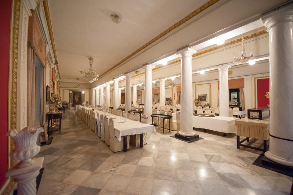 The grand dining room inside the Jai Vilas Palace. The Jai Vilas Mahal was established in 1874 by Jayajirao Scindia, the Maharaja of Gwalior. (Photo by Atid Kiattisaksiri/LightRocket via Getty Images)