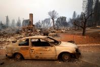 Burned car at the Dixie Fire in Greenville