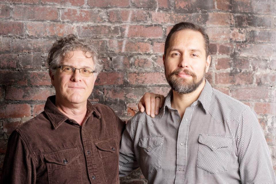 Shawn McDermott, left, and Pablo "Oso" Fuentes are cofounders of the Cosmic Songwriters Festival and monthly showcases in Bloomington.